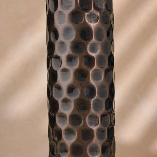 antique diamond-designed copper bottle